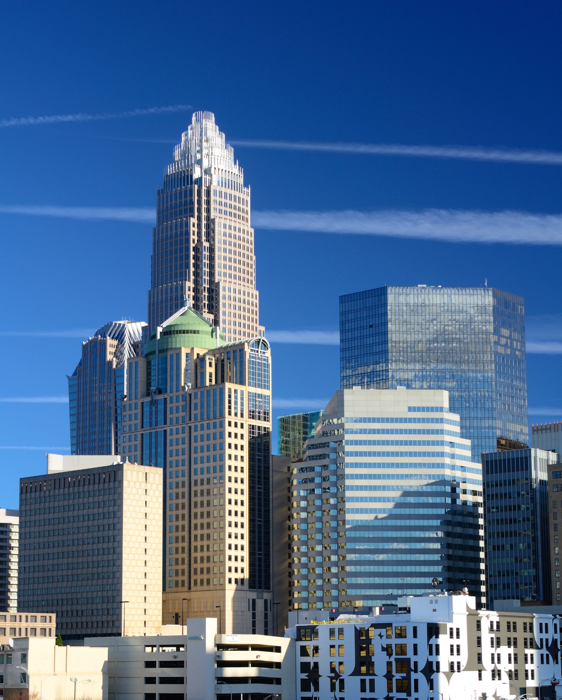 Uptown Charlotte skyline against a blue sky